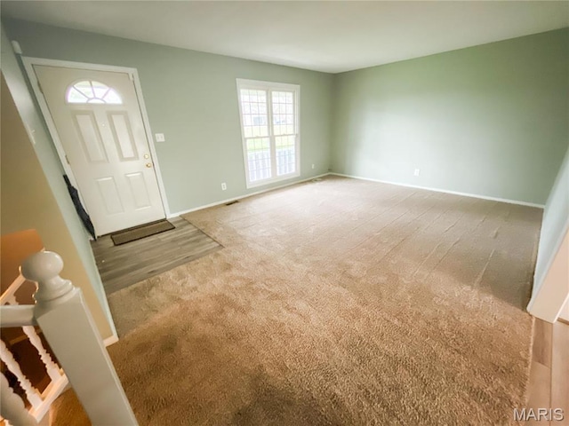 19113 Bent Oak Dr, Warrenton, MO 63383 - entryway with carpet and baseboards
