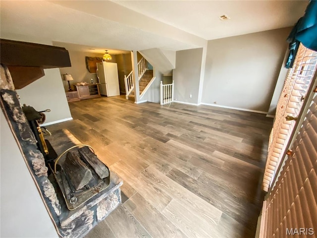 19113 Bent Oak Dr, Warrenton, MO 63383 - unfurnished living room featuring wood finished floors and stairs