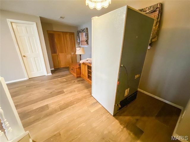 19113 Bent Oak Dr, Warrenton, MO 63383 - hallway with light wood-style floors and baseboards