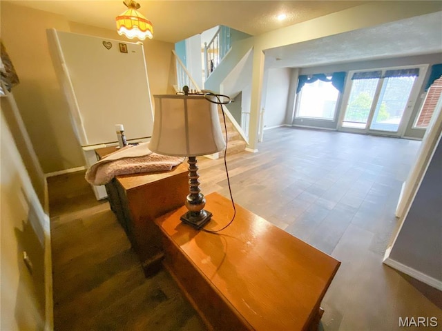 19113 Bent Oak Dr, Warrenton, MO 63383 - living area featuring stairs and wood finished floors