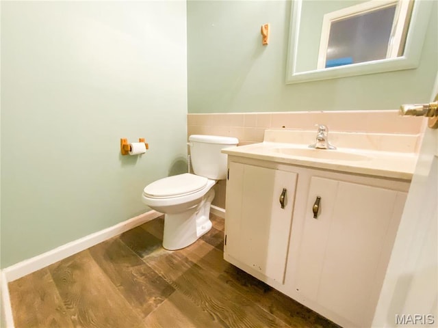 19113 Bent Oak Dr, Warrenton, MO 63383 - half bath featuring vanity and wood finished floors