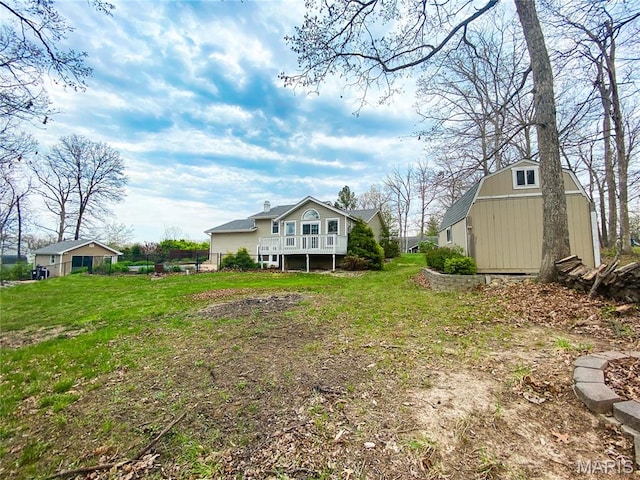 19113 Bent Oak Dr, Warrenton, MO 63383 - rear view of house featuring a shed and a yard