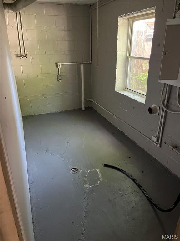 3253 Coles Ave, Saint Louis, MO 63114 - basement featuring electric panel and concrete block wall