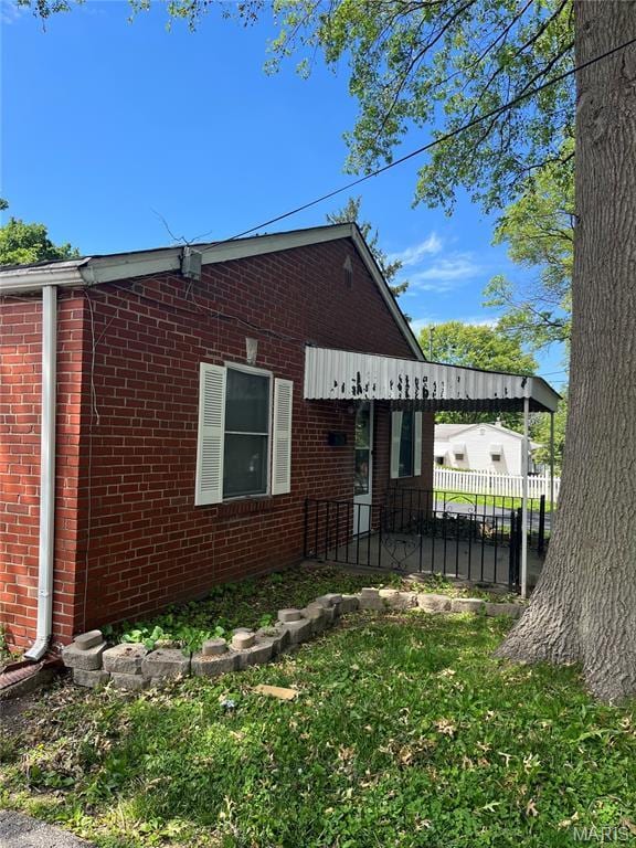 3253 Coles Ave, Saint Louis, MO 63114 - back of property featuring brick siding
