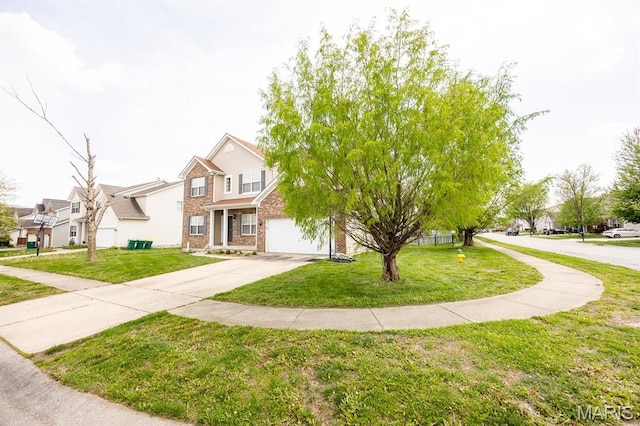 view of front of house with concrete driveway, brick siding, and a front yard