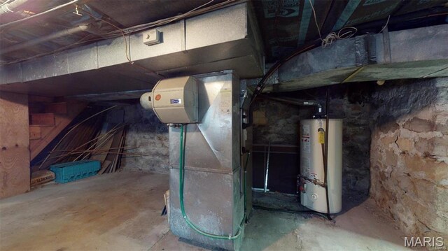921 Morrison Ave, Saint Louis, MO 63104 - utility room featuring water heater and heating unit