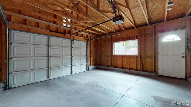 921 Morrison Ave, Saint Louis, MO 63104 - garage featuring a garage door opener