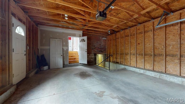 921 Morrison Ave, Saint Louis, MO 63104 - garage featuring a garage door opener