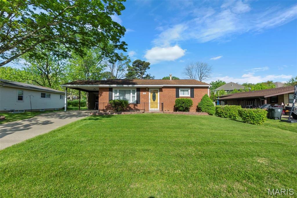 1141 Landgraf Dr, Cape Girardeau, MO 63701 - ranch-style house featuring brick siding, concrete driveway, a front yard, and a carport
