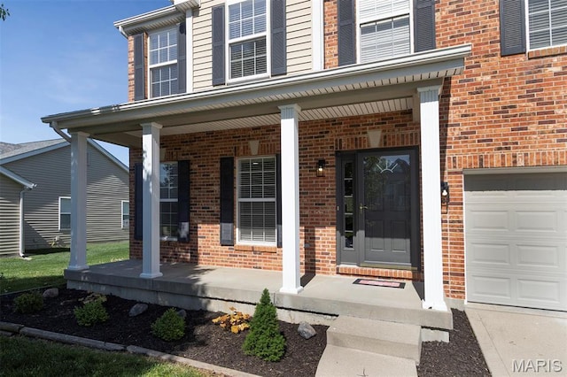 1739 Naughton Way, Swansea, IL 62226 - entrance to property featuring a porch, brick siding, and a garage