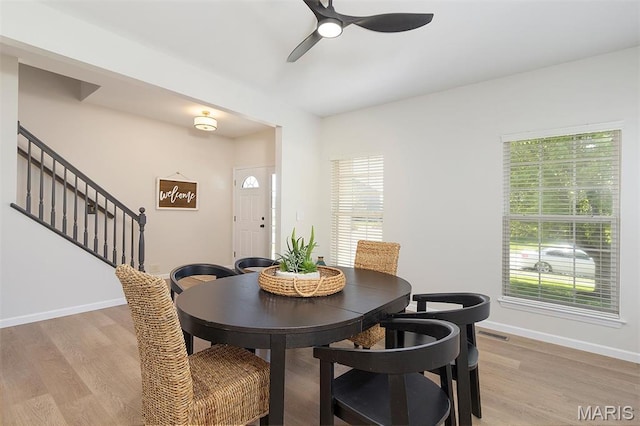 1739 Naughton Way, Swansea, IL 62226 - dining space featuring a ceiling fan, healthy amount of natural light, stairs, and light wood finished floors