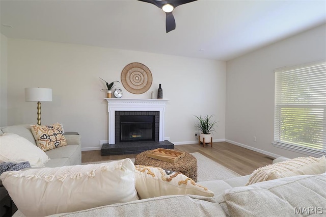 1739 Naughton Way, Swansea, IL 62226 - living room with ceiling fan, a fireplace, wood finished floors, and baseboards