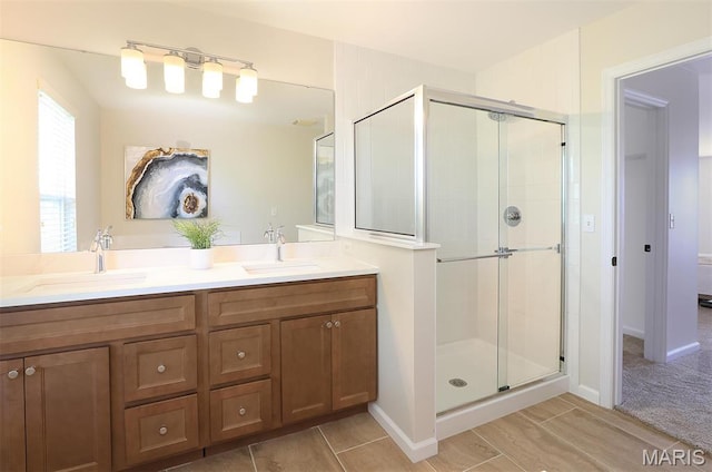 1739 Naughton Way, Swansea, IL 62226 - bathroom featuring a stall shower, double vanity, and baseboards