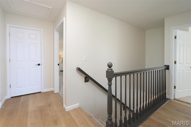 1739 Naughton Way, Swansea, IL 62226 - hallway with an upstairs landing, wood finished floors, and baseboards