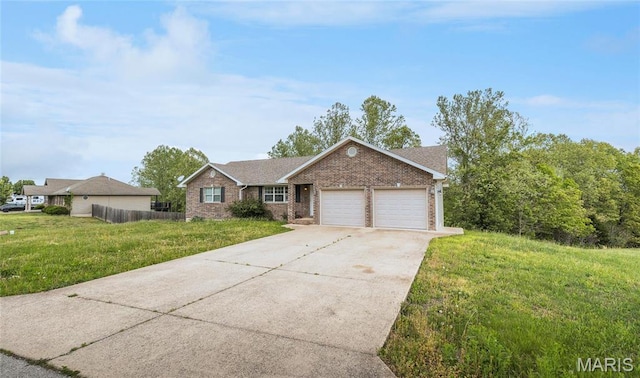 19252 Lambert Ln, Waynesville, MO 65583 - ranch-style home featuring an attached garage, driveway, and brick siding