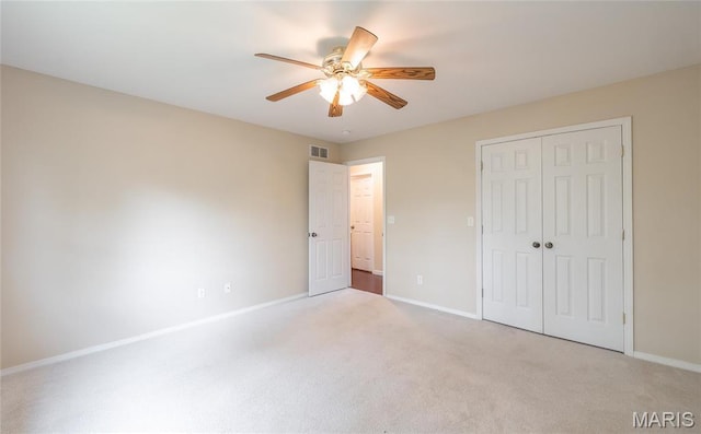 19252 Lambert Ln, Waynesville, MO 65583 - unfurnished bedroom with baseboards, carpet floors, and a closet