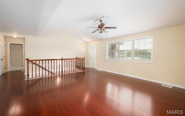19252 Lambert Ln, Waynesville, MO 65583 - spare room featuring ceiling fan, baseboards, wood-type flooring, and vaulted ceiling