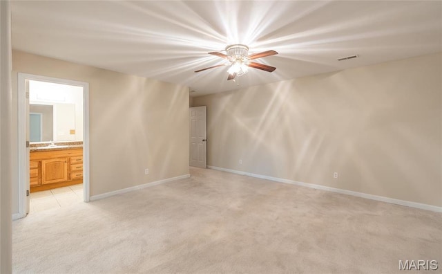 19252 Lambert Ln, Waynesville, MO 65583 - spare room with light carpet, ceiling fan, and baseboards