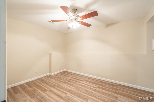 19252 Lambert Ln, Waynesville, MO 65583 - unfurnished room with light wood-style flooring, baseboards, and a ceiling fan