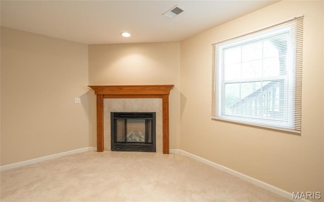 19252 Lambert Ln, Waynesville, MO 65583 - unfurnished living room featuring carpet flooring, a tile fireplace, baseboards, and recessed lighting