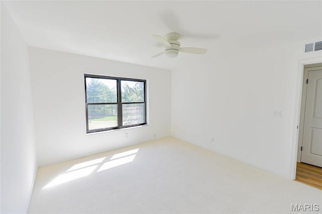 590 Sarah Ln Unit 303, Saint Louis, MO 63141 - spare room featuring light colored carpet and a ceiling fan