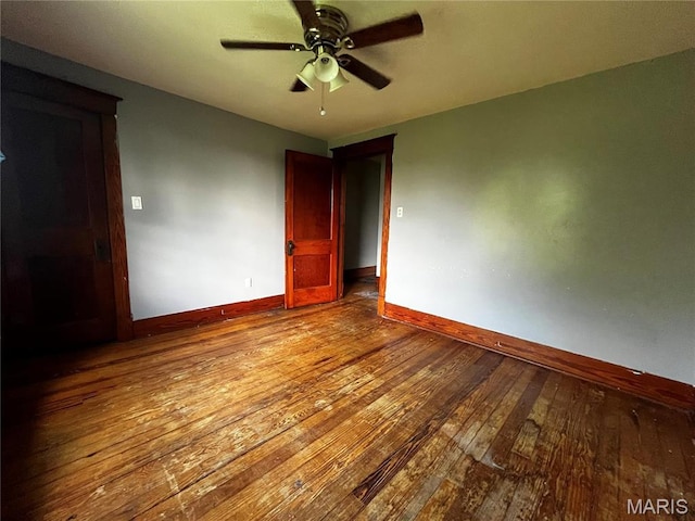 114 S Water St, Truesdale, MO 63380 - spare room with hardwood / wood-style flooring, baseboards, and a ceiling fan