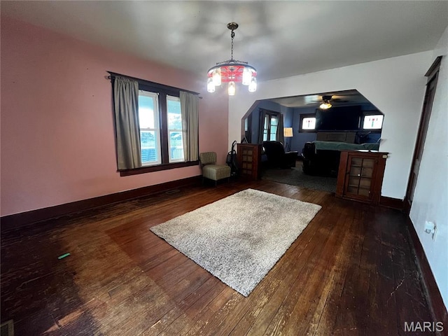 114 S Water St, Truesdale, MO 63380 - interior space with dark wood-style flooring, a ceiling fan, and baseboards