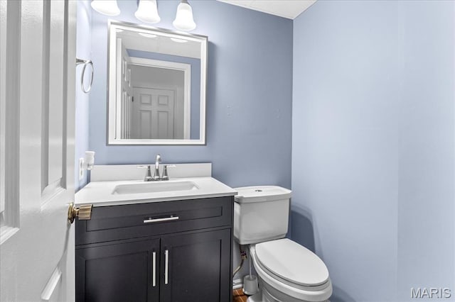 27 Heatherwood Dr, Collinsville, IL 62234 - half bathroom featuring vanity and toilet