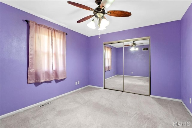 27 Heatherwood Dr, Collinsville, IL 62234 - unfurnished bedroom featuring multiple windows, carpet floors, baseboards, and a ceiling fan