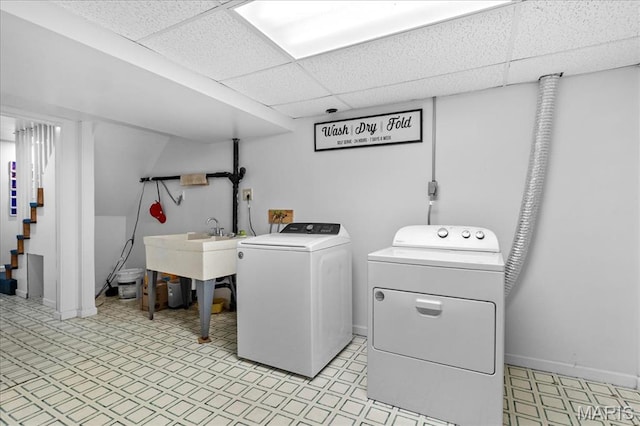 27 Heatherwood Dr, Collinsville, IL 62234 - washroom featuring washer and dryer, light floors, and baseboards