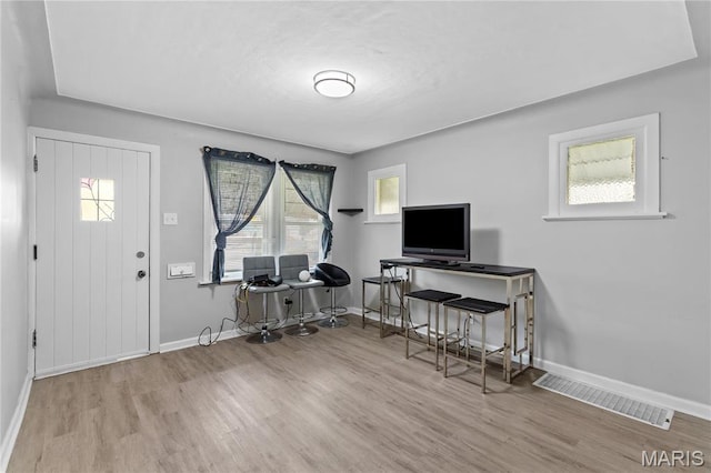 3700 Viking, Saint Louis, MO 63125 - office featuring wood finished floors, baseboards, and healthy amount of natural light
