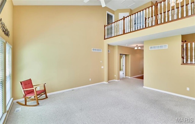 225 River Bluff Ct, Troy, MO 63379 - unfurnished room featuring carpet floors, high vaulted ceiling, baseboards, and a ceiling fan