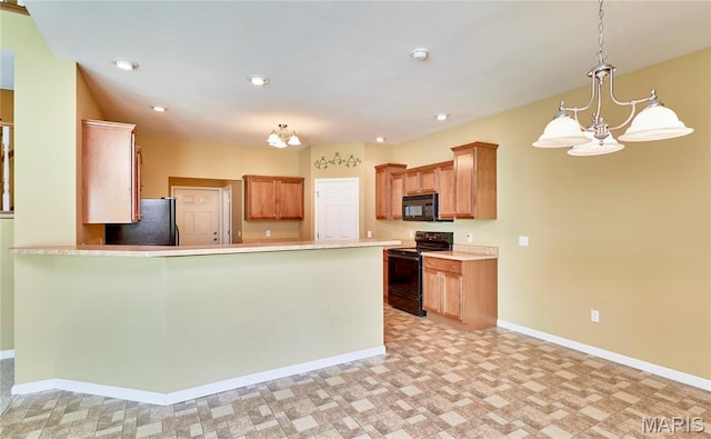 225 River Bluff Ct, Troy, MO 63379 - kitchen with black appliances, baseboards, a peninsula, a chandelier, and light countertops