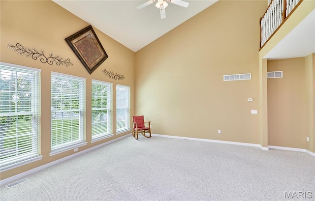 225 River Bluff Ct, Troy, MO 63379 - unfurnished room with high vaulted ceiling, light colored carpet, ceiling fan, and baseboards