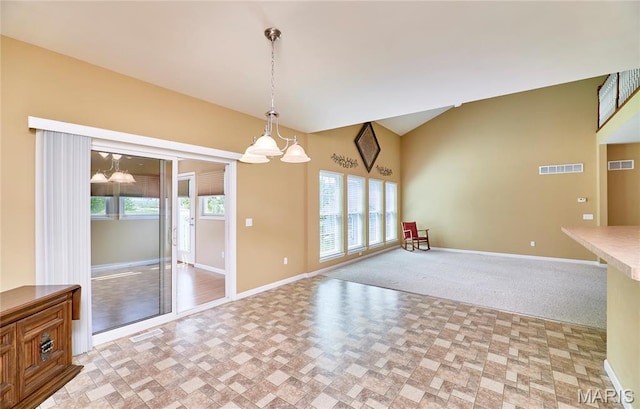 225 River Bluff Ct, Troy, MO 63379 - unfurnished dining area with baseboards and vaulted ceiling