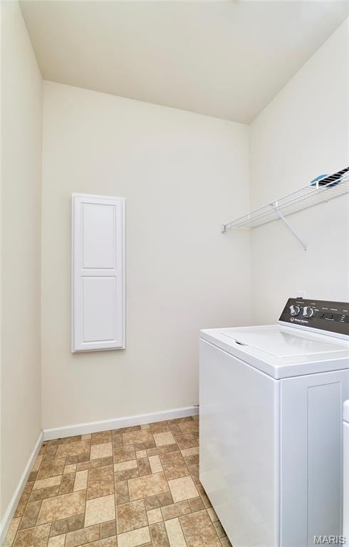 225 River Bluff Ct, Troy, MO 63379 - laundry room featuring washer / dryer and baseboards