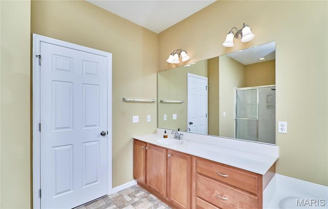 225 River Bluff Ct, Troy, MO 63379 - full bath with vanity, a stall shower, and baseboards