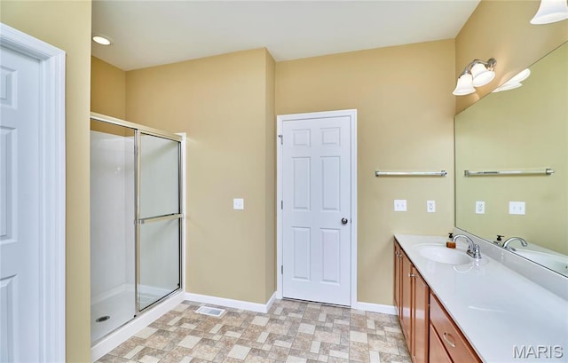 225 River Bluff Ct, Troy, MO 63379 - full bathroom with baseboards, a shower stall, and vanity
