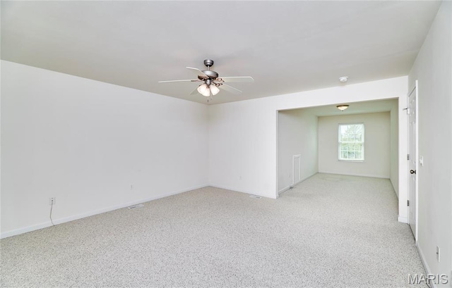 225 River Bluff Ct, Troy, MO 63379 - empty room with a ceiling fan, light carpet, and baseboards