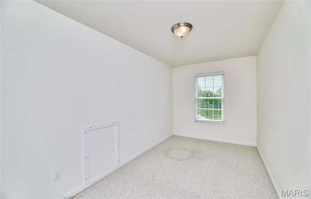 225 River Bluff Ct, Troy, MO 63379 - carpeted empty room featuring baseboards