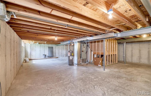 225 River Bluff Ct, Troy, MO 63379 - unfinished below grade area featuring water heater and heating unit