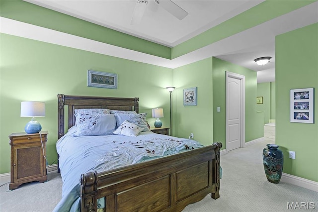 bedroom featuring carpet, baseboards, and a ceiling fan