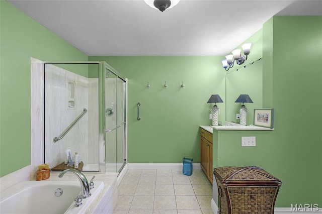 full bathroom with vanity, a bath, a stall shower, and tile patterned floors