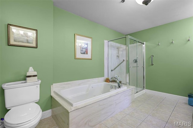 full bathroom with tile patterned flooring, a stall shower, toilet, baseboards, and a tub with jets