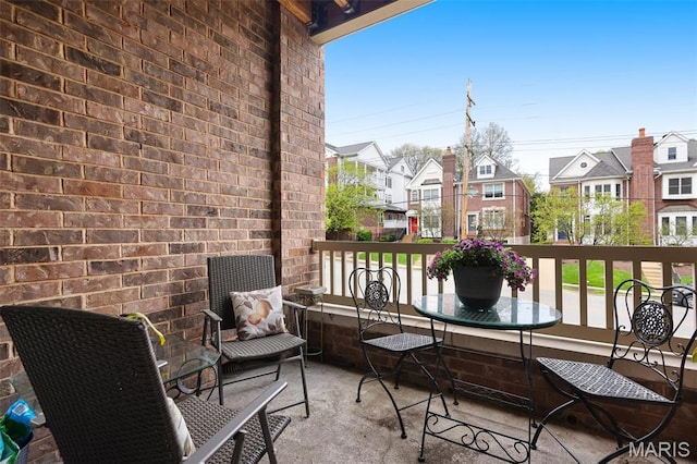 balcony featuring a residential view