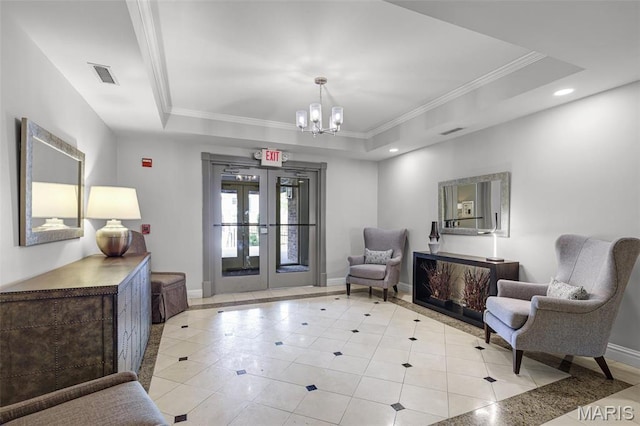 building lobby with ornamental molding and recessed lighting