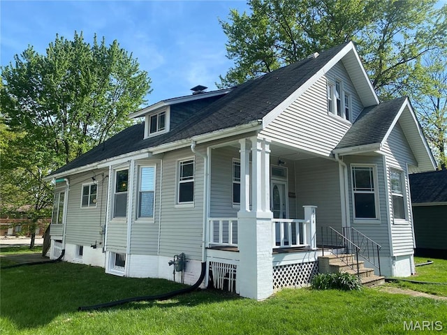 616 N Church St, Belleville, IL 62220 - view of side of home featuring a lawn and covered porch