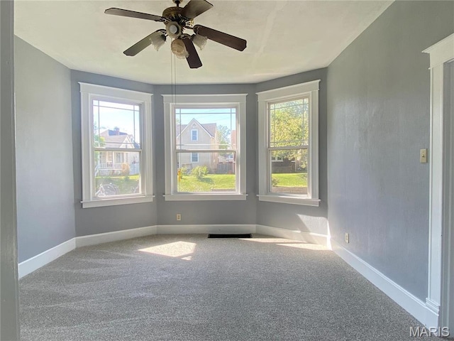616 N Church St, Belleville, IL 62220 - spare room with carpet floors, baseboards, and ceiling fan