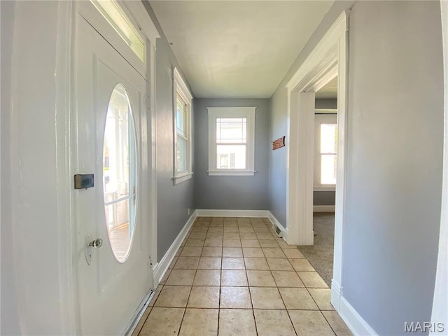 616 N Church St, Belleville, IL 62220 - doorway to outside with light tile patterned flooring and baseboards