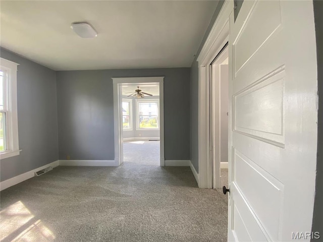 616 N Church St, Belleville, IL 62220 - carpeted spare room featuring baseboards and a ceiling fan